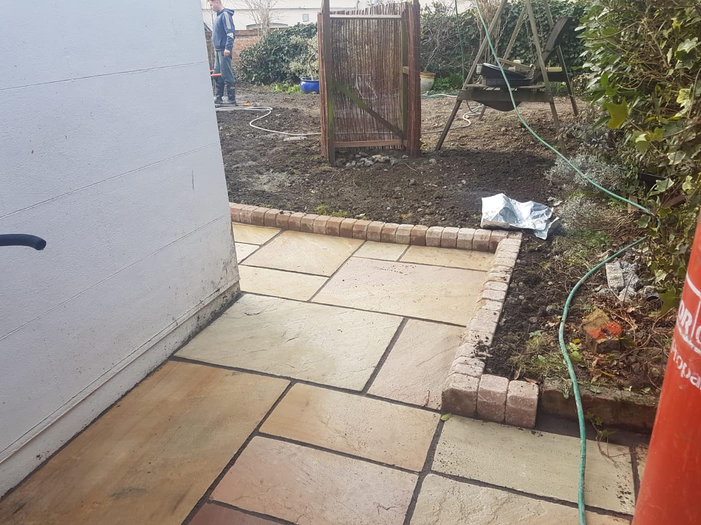 Sandstone patio laid by South East Groundworks