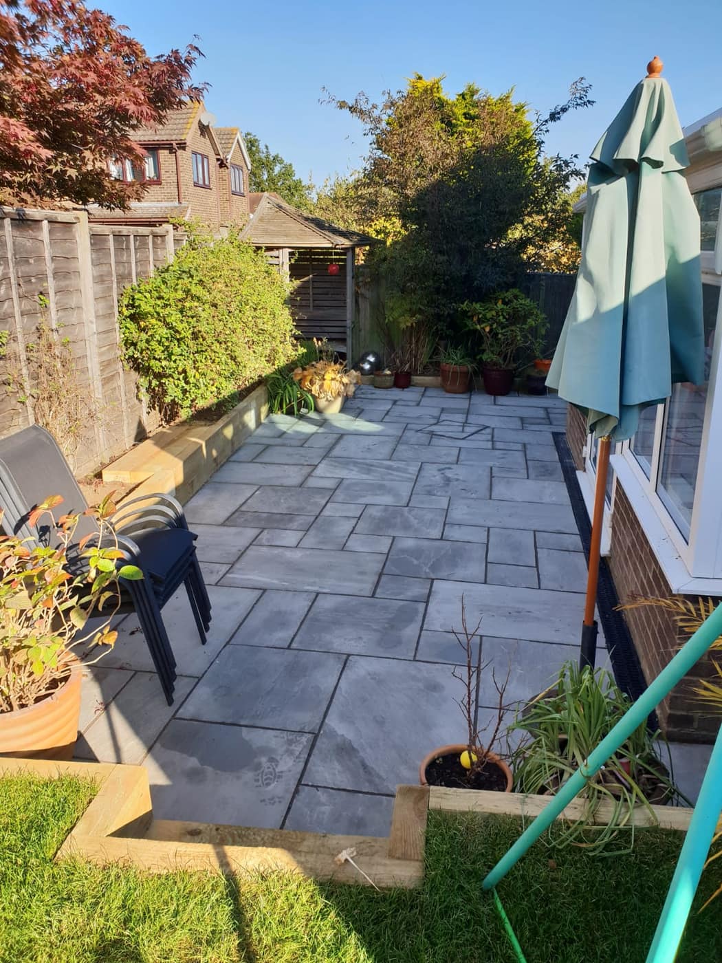 Grey porcelain patio laid by South East Groundworks
