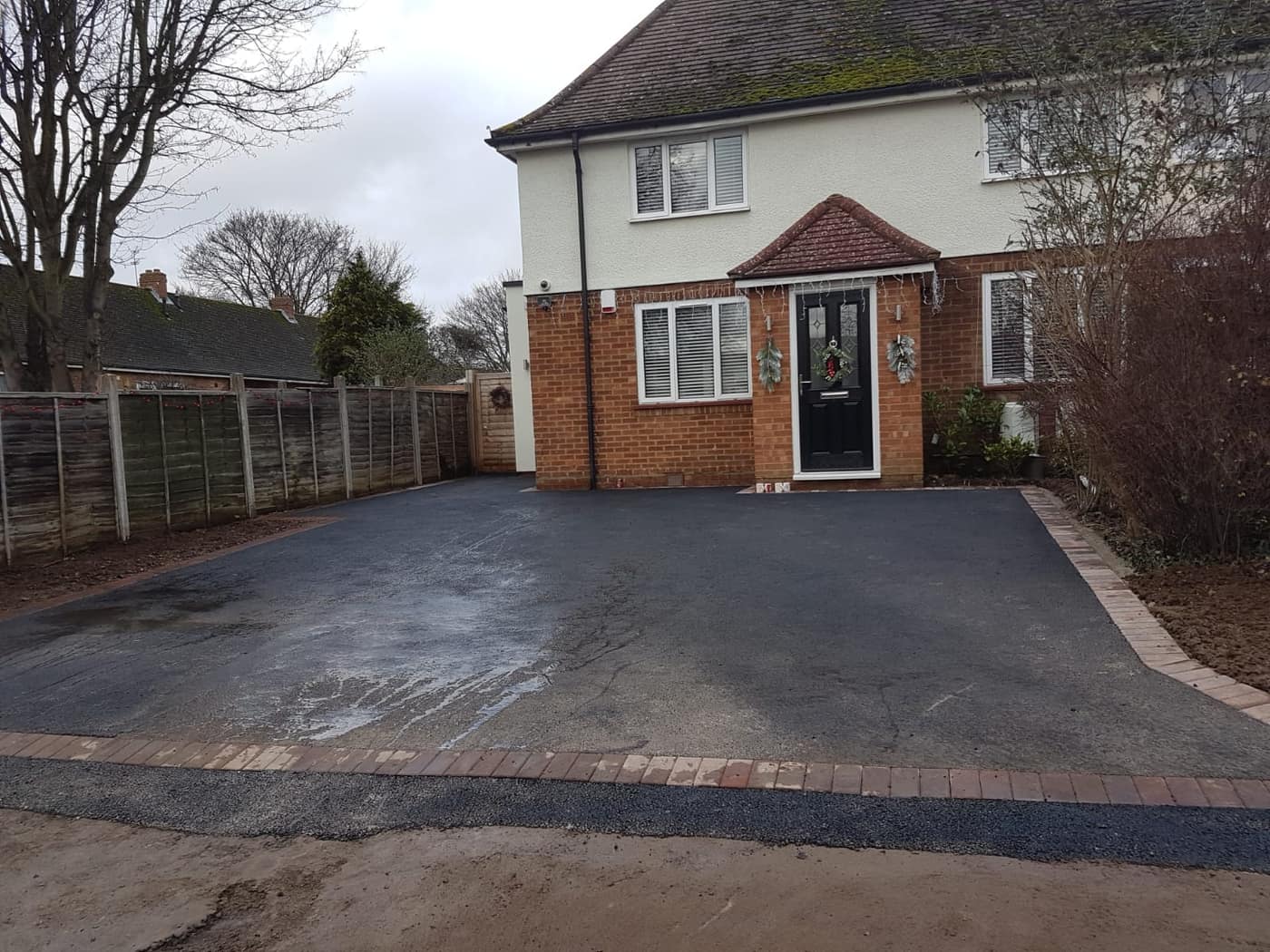 Tarmac driveway with block paving border